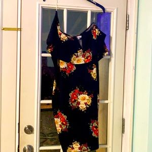 Only wore once super stretchy and cute off the shoulder